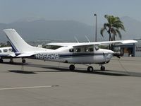 N955WG @ POC - Tied down in transient parking - by Helicopterfriend