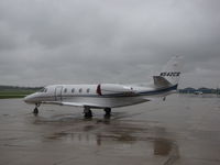 N542CS @ KOSH - On a wet and windy Orion FBO ramp @ KOSH - by steveowen