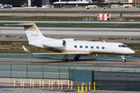 N728MM @ LAX - N728MM taxiing to the FBO after arrival from Las Vegas McCarran Int'l (KLAS). - by Dean Heald
