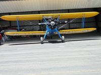 N75223 @ AJO - Parked in hanger appearing to have some work in progress - by Helicopterfriend
