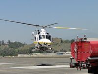 N14LA @ POC - Hovering over to the pad and fuel truck for re-fueling - by Helicopterfriend
