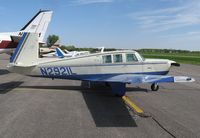 N2921L @ KAXN - Mooney M20F on the line.