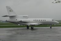N102TF @ KAXN - Dassault Falcon 50 taxiing to runway 13 for departure. - by Kreg Anderson