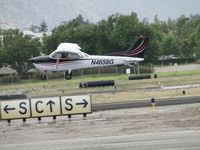 N4658G @ POC - Strong gust of wind caused correction while landing on runway 26L - by Helicopterfriend