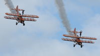 N74189 @ EGSU - N74189 (2) & N707TJ(3) working very hard in extremely blustery conditions at at Duxford's Spring Air Show, May 2011