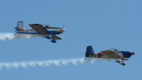 G-RVMZ @ EGSU - 45. G-RVMZ working very hard in extremely blustery conditions at at Duxford's Spring Air Show, May 2011