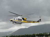 N14LA @ POC - Flaring out to make a sharp left turn next to the fuel truck - by Helicopterfriend