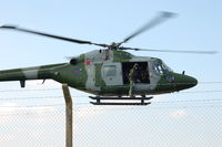 XZ190 @ EGFH - Over the fence. AAC Lynx. - by Roger Winser