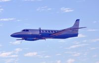N727DP @ KGTU - Over Central Texas. Photographed from a C-182 - by Jerry White