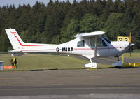 G-MIRA @ EBSP - Parking position. NO, the parking tarmac is NOT horizontal.... from far NOT. - by Philippe Bleus
