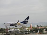 XA-GMV @ LAX - Landing on runway 24R - by Helicopterfriend