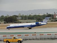 N715SK @ LAX - Waiting to take off on runway 24L - by Helicopterfriend