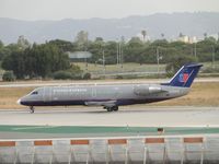N961SW @ LAX - United Express operated by Sky West and taking off on runway 24L - by Helicopterfriend