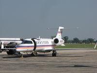 N20FE @ KOSH - being refueled at Basler FBO - by steveowen