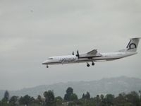 N429QX @ LAX - While landing on runway 24R, tried to capture helicopter in upper left corner - by Helicopterfriend