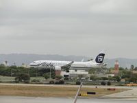 N525AS @ LAX - Touching down on runway 24L - by Helicopterfriend