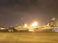 N609AS @ KLAX - Being towed out into the alley - by Nick Taylor Photography