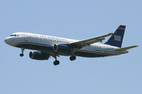 N650AW @ DFW - US Airways landing at DFW Airport.