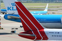 PH-MCI @ EHAM - Martinair - by Chris Hall