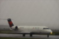 N430SW @ BIL - Skywest CL-600 @ BIL --  Yet another rainy day.