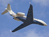 N530FX @ KBFI - Climbing from rwy 13R. - by Philippe Bleus