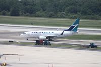 C-FMWJ @ TPA - West Jet 737 - by Florida Metal