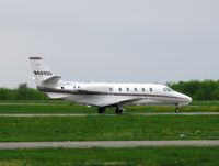 N689QS @ KAXN - Cessna 560XL Citation Excel taxiing to runway 31.