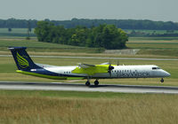 HB-JGA @ LOWW - Sky Work DHC-8 - by Thomas Ranner