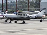 N595LT @ POC - Parked at Howard Aviation parking area - by Helicopterfriend