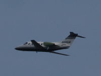 N408CW @ KOSH - Taken from my back yard on climb out from KOSH runway 09