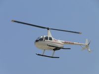 N916VK @ CNO - Air Taxiing to the northwest parking area - by Helicopterfriend