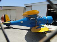 N51746 @ CNO - Beech UC-43 Traveler 10842 (c/n 4890), parked outside Yank's Air Museum hanger - by Helicopterfriend