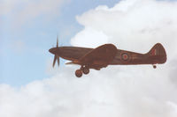 PS915 @ CAX - The Battle of Britain Memorial Flight Spitfire PR.XIX landing at Carlisle for the 1994 Airshow. - by Peter Nicholson