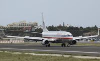 N938AN @ TNCM - American airlines landing at TNCM