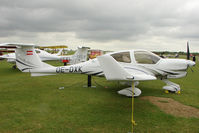 OE-DXK @ EGBK - Diamond DA40NG, c/n: N016 exhibited at AeroExpo 2011 at Sywell - by Terry Fletcher