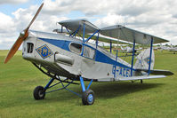 G-ACEJ @ EGBK - The wings of the 1933 De Havilland DH83 FOX MOTH, c/n: 4069 folded back at Sywell