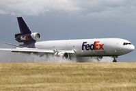 N602FE @ LFPG - wet runways are the best - by Jeroen Stroes