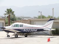 N5239M @ AJO - Tied down next to a hanger - by Helicopterfriend