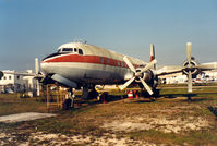 N1097 @ 34AZ - Opa Locka , DC-7B - by Henk Geerlings