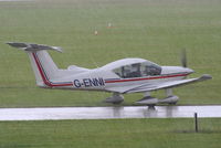 G-ENNI @ EGBK - arriving during one of the rain storms at at AeroExpo 2011 - by Chris Hall