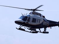 N318PD - Flying along beach @ Brighton Beach, Brooklyn,NY - by gbmax