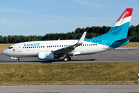 LX-LGS @ ELLX - taxying to the holding point RW24 - by Friedrich Becker