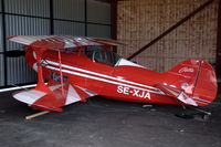 SE-XJA @ ESOW - Pitts S-1T parked in a hangar at Västerås Hässlö airport, Sweden