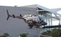 N175MS - Bell 206 leaving Heliexpo Orlando - by Florida Metal