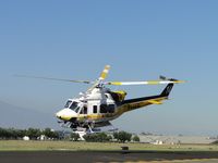 N14LA @ POC - Victim and crew onboard and heading out westbound from taxiway Sierra - by Helicopterfriend