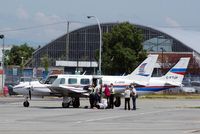 C-GPAP @ YVR - Passengers unloading.
Another OrcaAir Piper in different livery in background. - by metricbolt