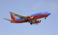 N679AA @ KLAX - Landing at LAX - by Todd Royer