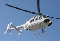N422HM - Bell 407 leaving Heliexpo Orlando - by Florida Metal