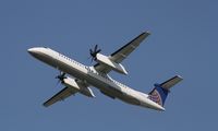 N333NG @ KORD - DHC-8-400 - by Mark Pasqualino