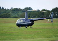 G-BZXY @ EGTB - Robinson R44 Raven at Wycombe Air Park - by moxy